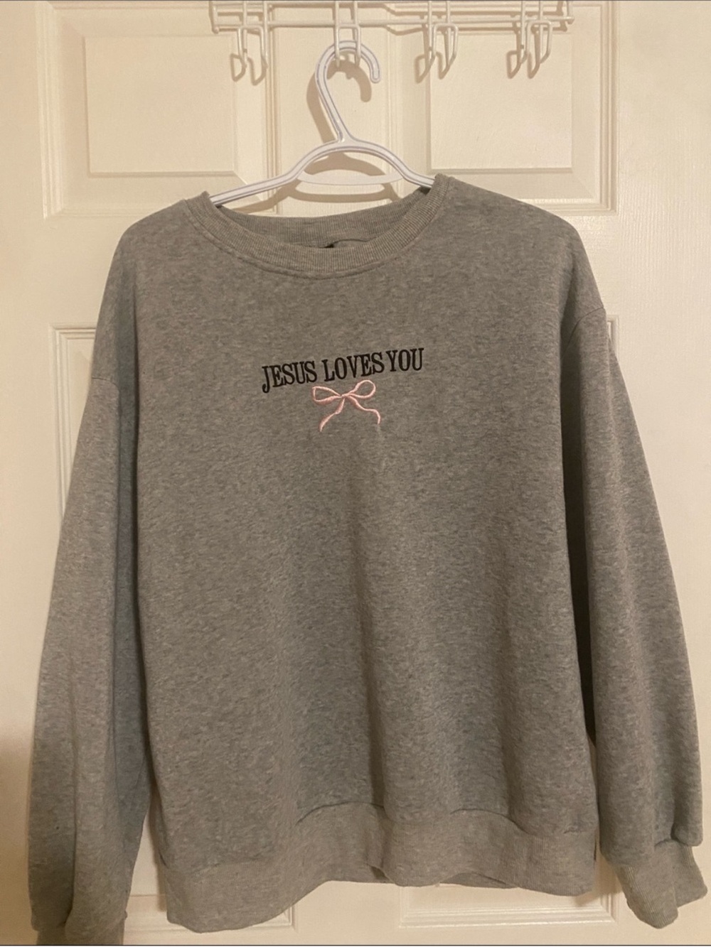 Gray "Jesus Loves You" Sweatshirt with Pink Bow